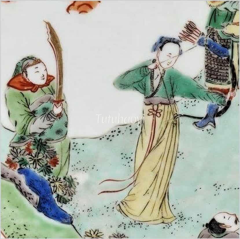 a woman pulling the string of a bow beside a soldier
