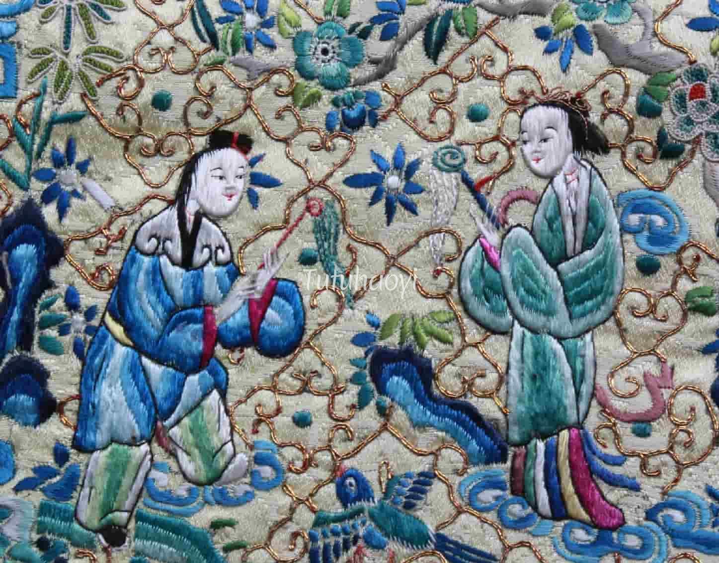 clothes embroidery depicting Weaving Maiden and Herd Boy reuniting 