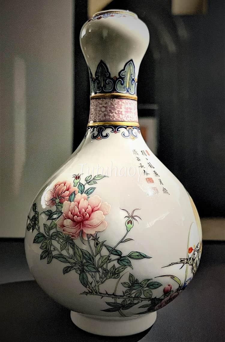porcelain garlic mouth bottle vase painted with peonies and birds in Falangcai style