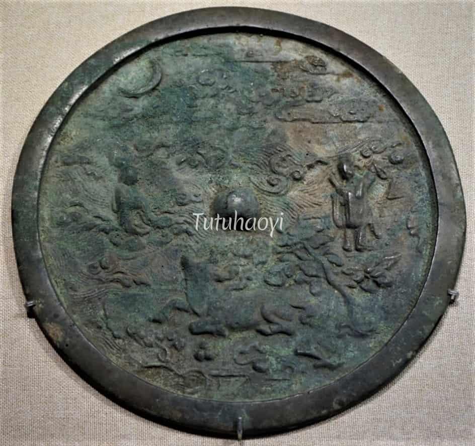 bronze mirror depicting Weaving Maiden and Herd Boy reuniting 